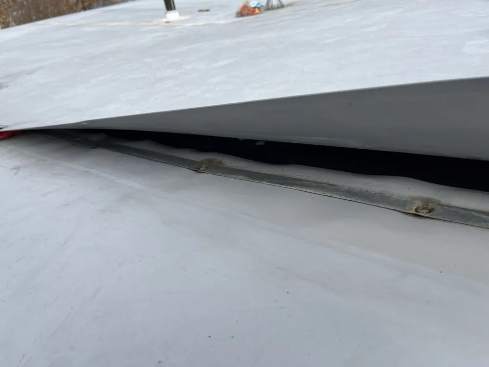 Slide of EAW Roofing and Construction