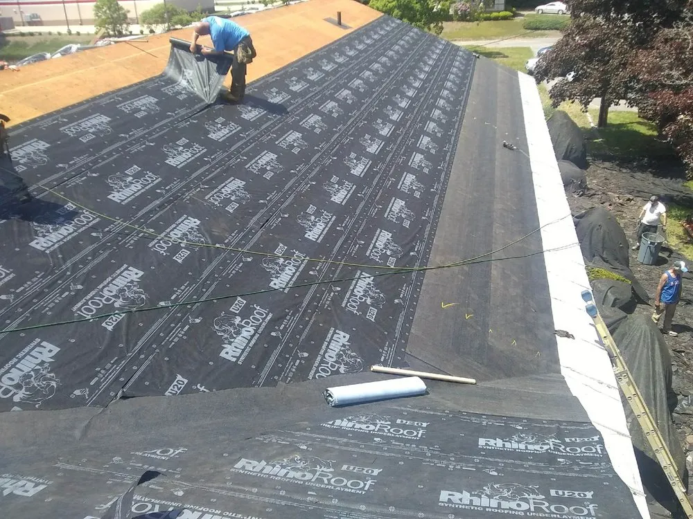 Slide of EAW Roofing and Construction