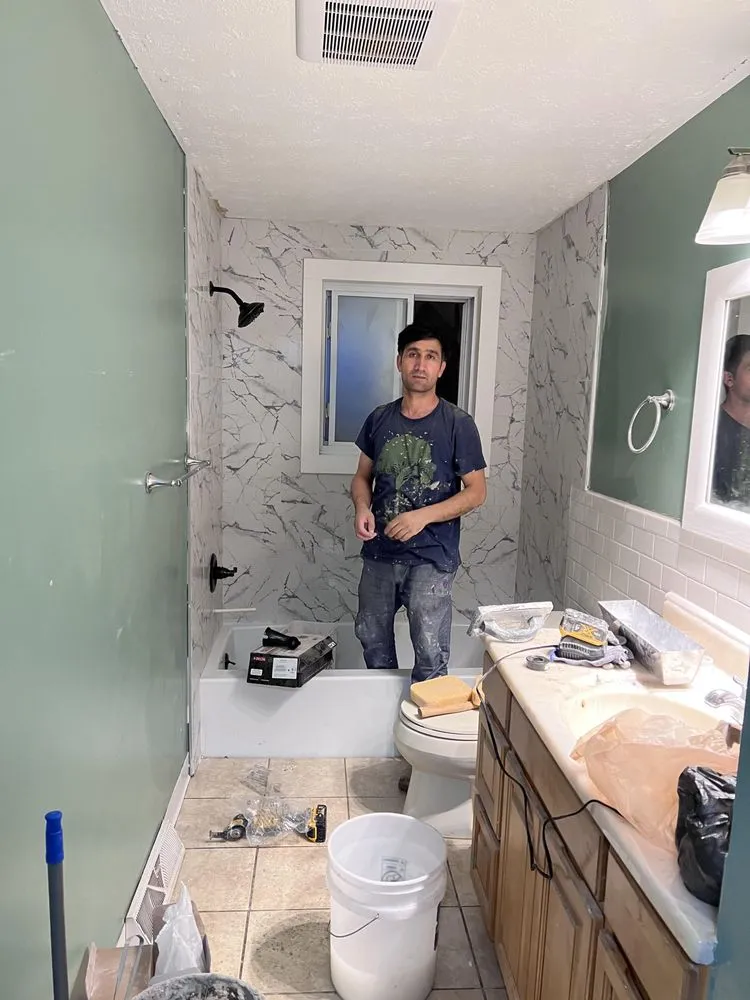 Slide of E.B Construction & Design