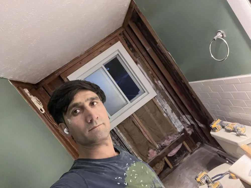 Slide of E.B Construction & Design