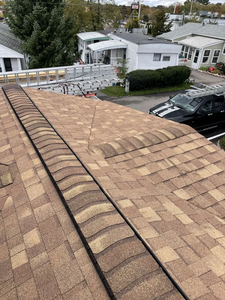 Slide of E&B Roofing