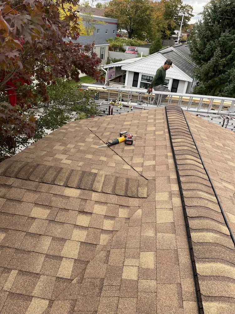 Slide of E&B Roofing