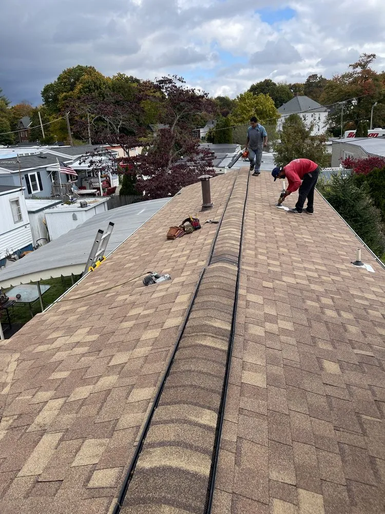 Slide of E&B Roofing