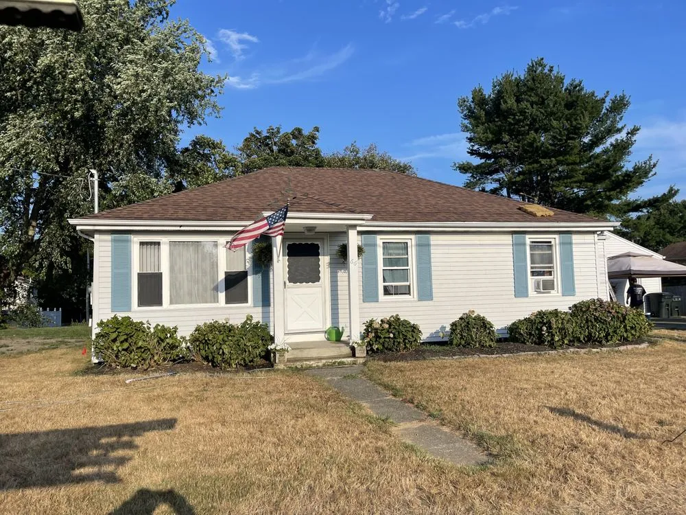 Slide of E&B Roofing