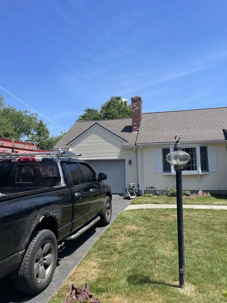 Slide of E&B Roofing