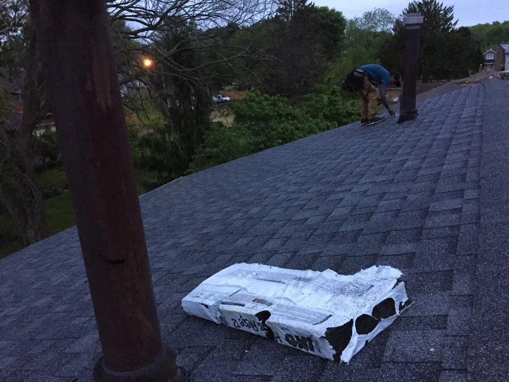 Slide of EC Roofing & Siding