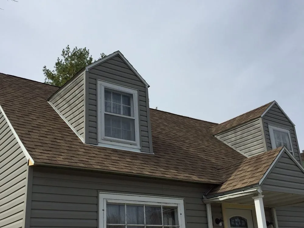 Slide of EC Roofing & Siding