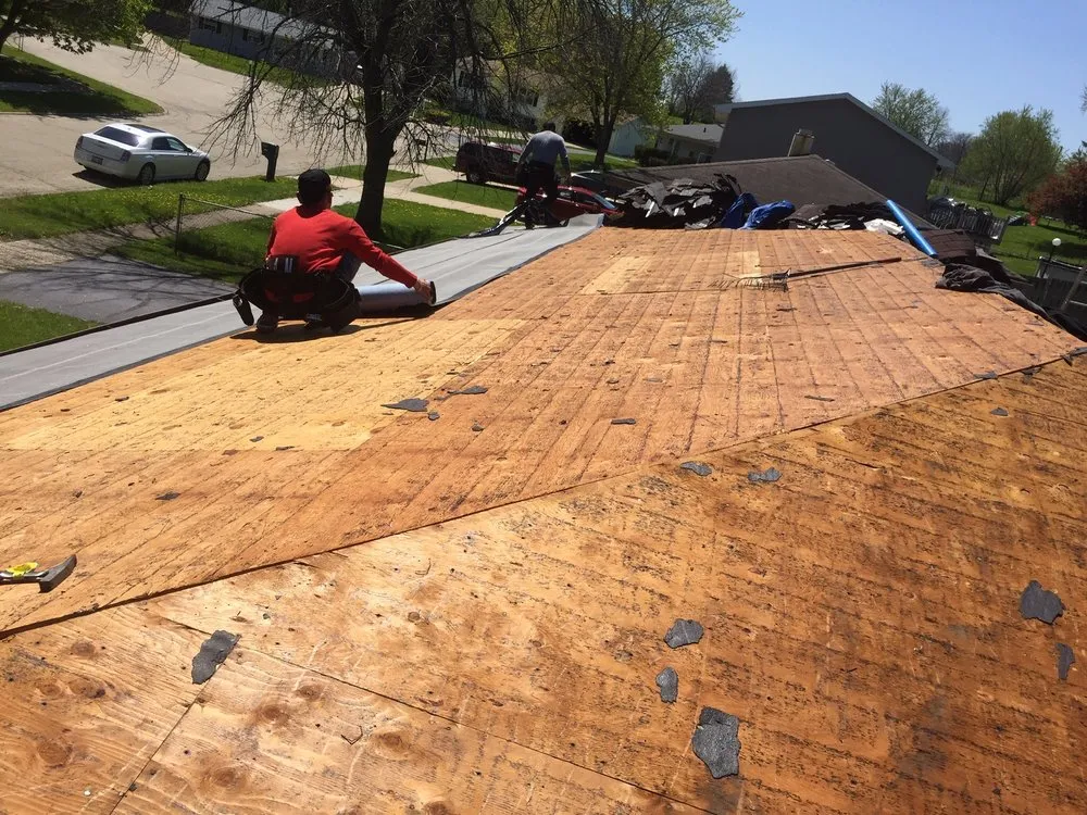 Slide of EC Roofing & Siding