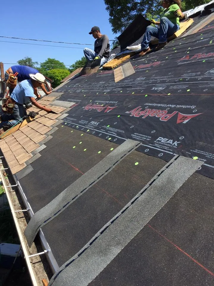 Slide of EC Roofing & Siding