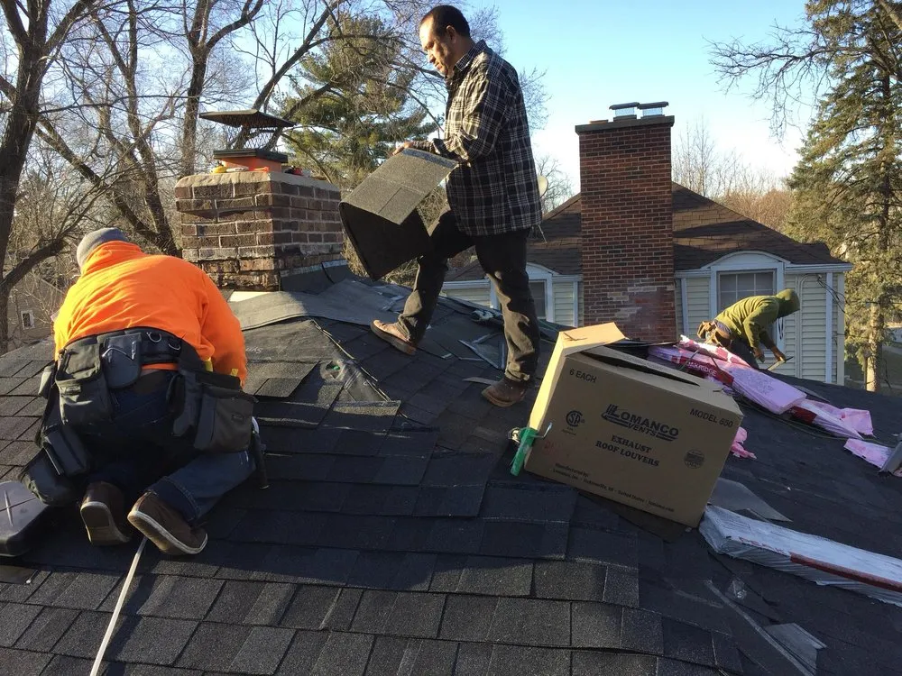 Slide of EC Roofing & Siding