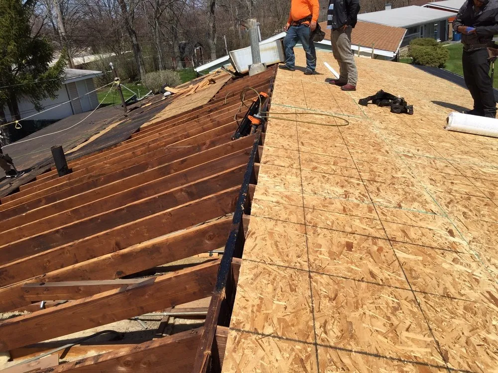 Slide of EC Roofing & Siding