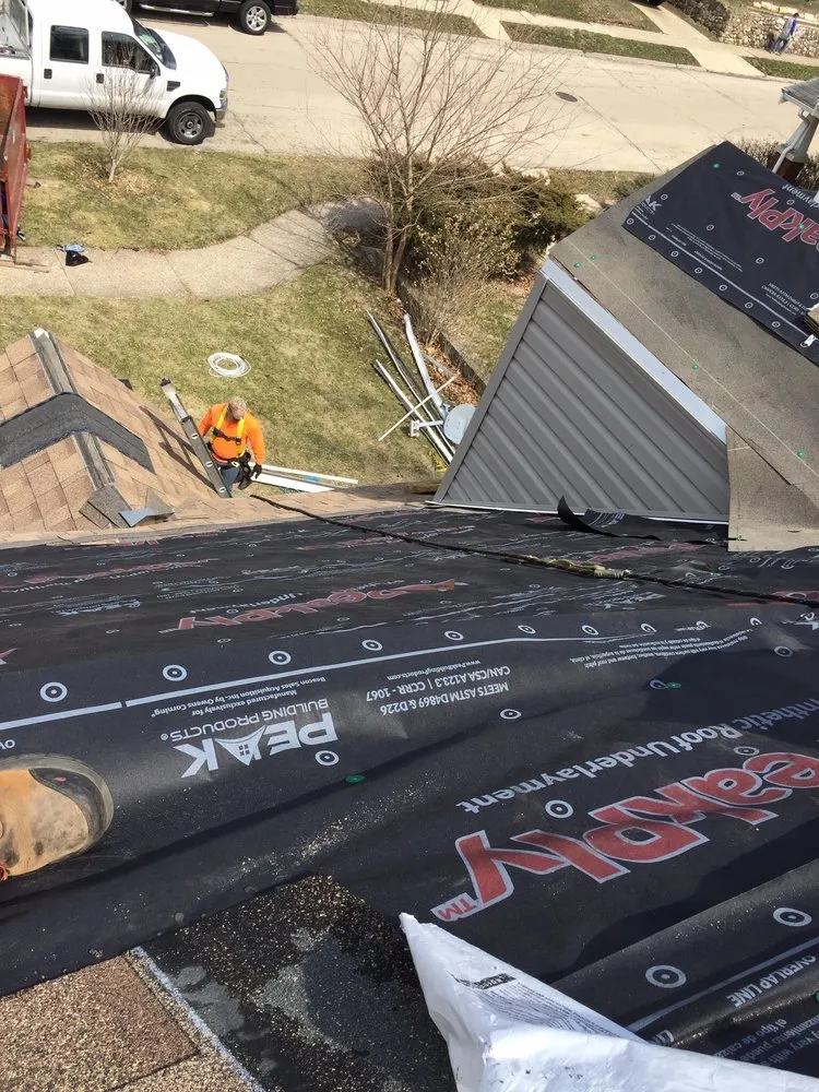 Slide of EC Roofing & Siding