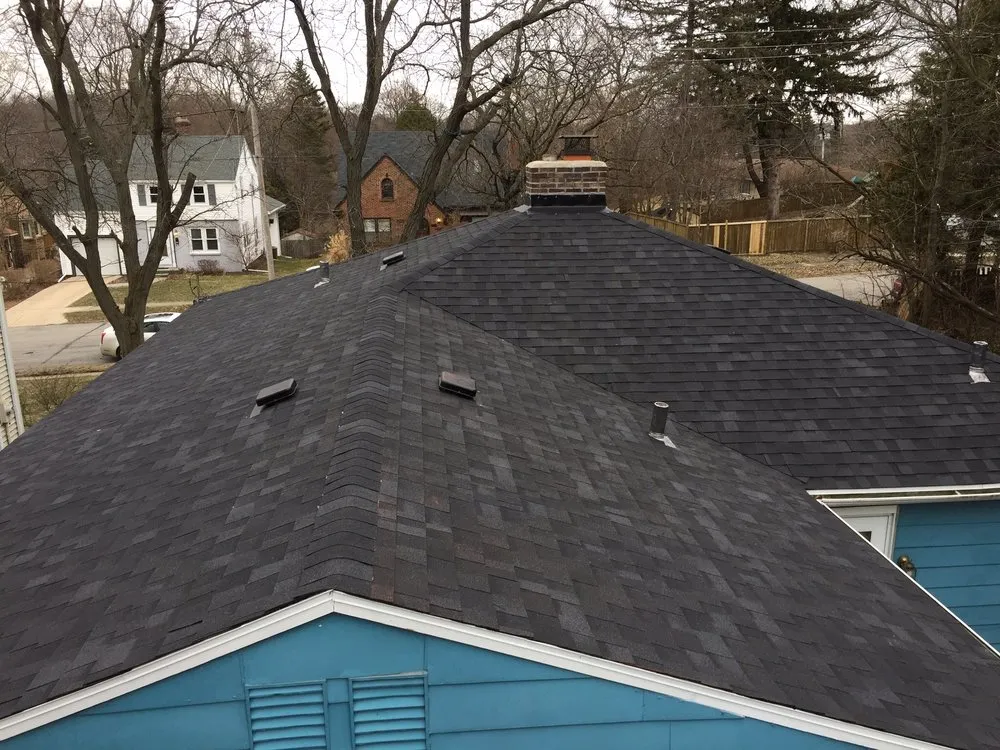 Slide of EC Roofing & Siding