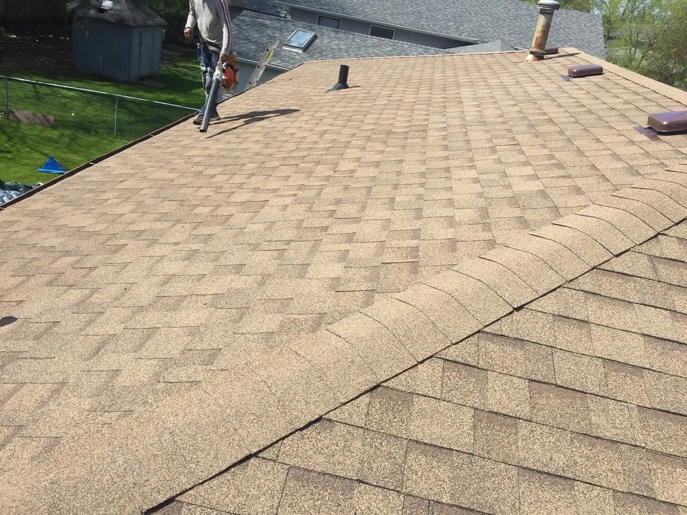 Slide of EC Roofing & Siding