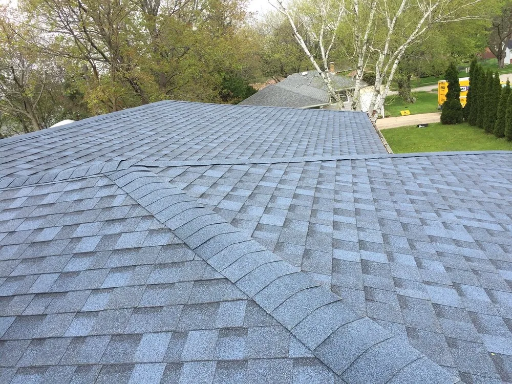 Slide of EC Roofing & Siding