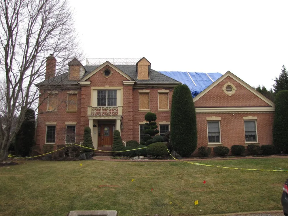 Slide of EC Roofing and Home Services Direct