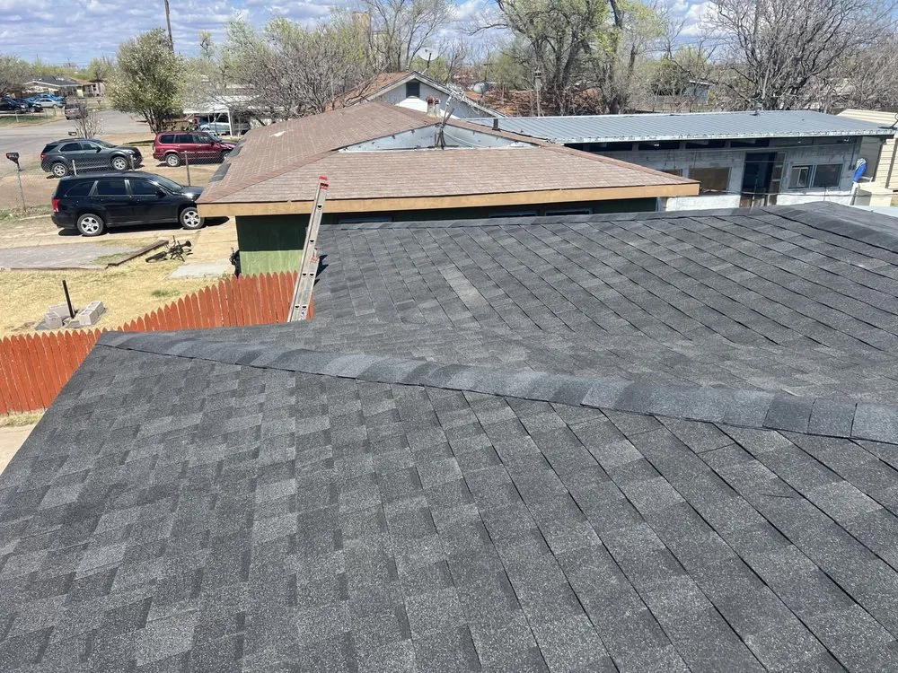 Slide of EC Roofing