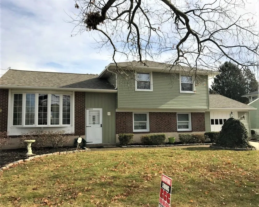 Slide of ECC Roofing & Siding