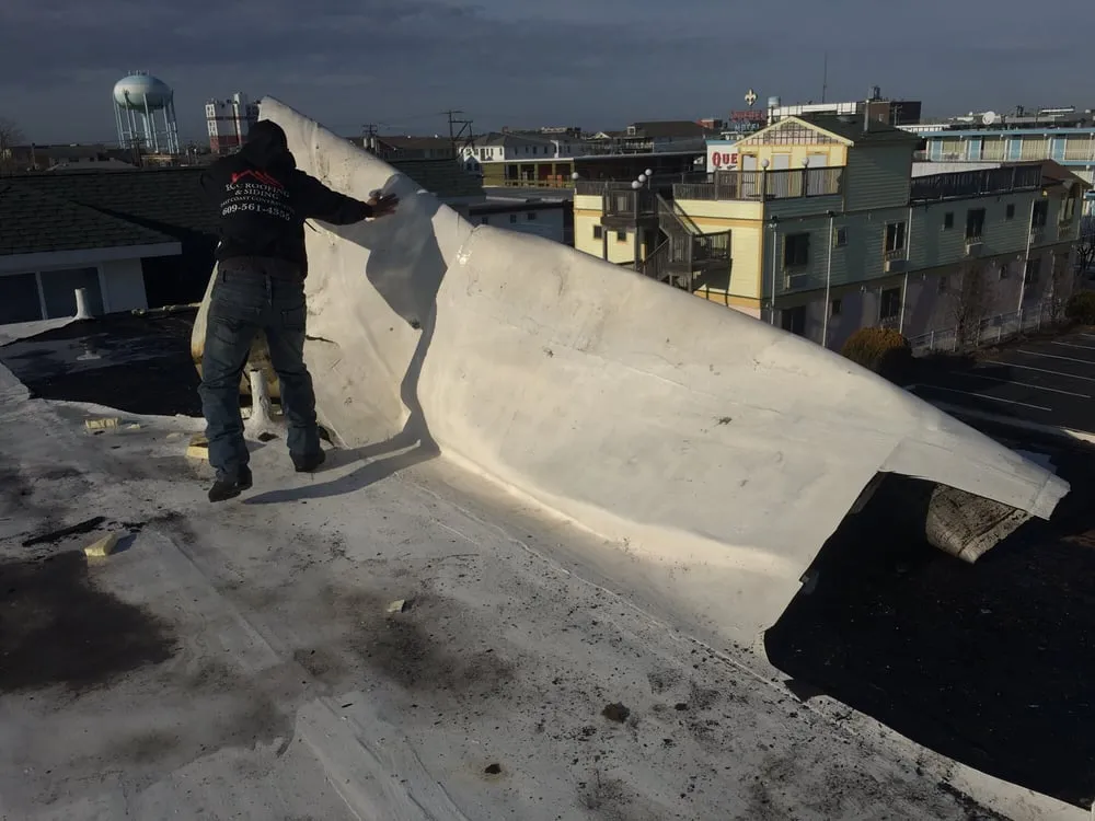 Slide of ECC Roofing & Siding