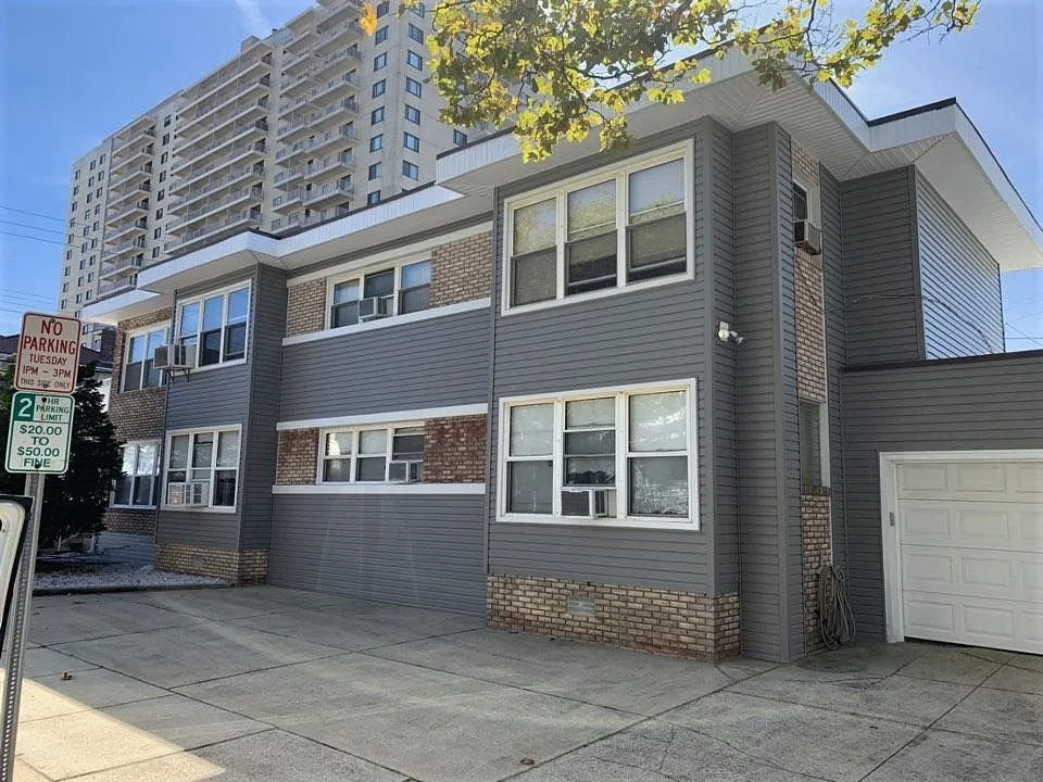 Slide of ECC Roofing & Siding