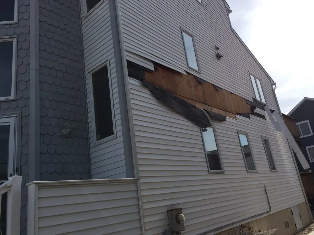 Slide of ECC Roofing & Siding