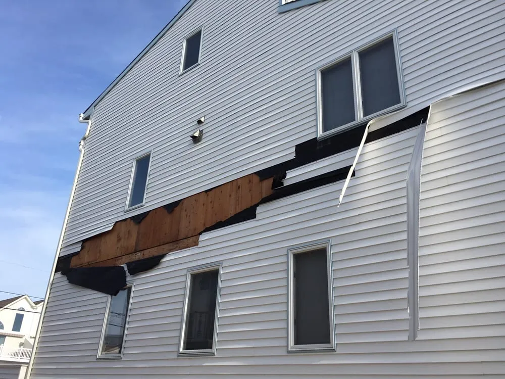 Slide of ECC Roofing & Siding