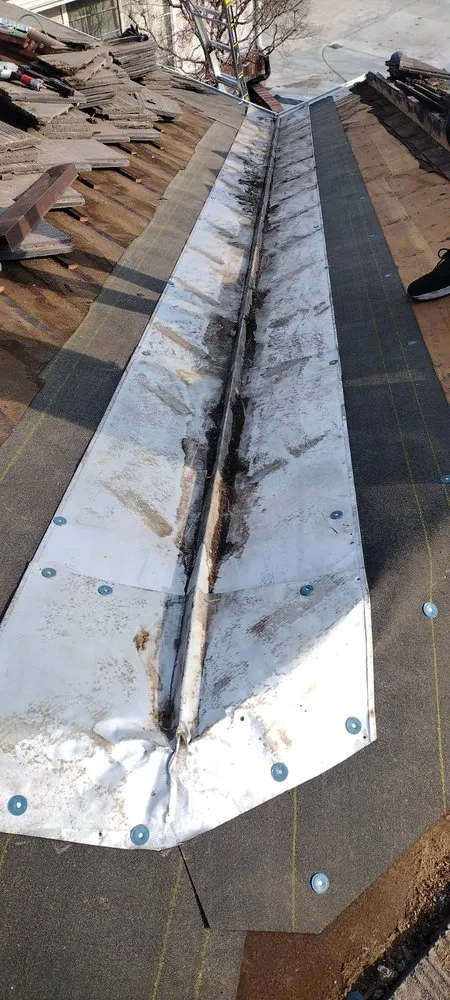 Slide of Echevarria Roofing