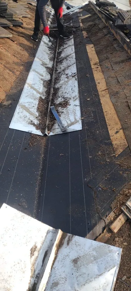 Slide of Echevarria Roofing