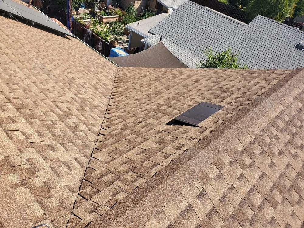 Slide of Echevarria Roofing