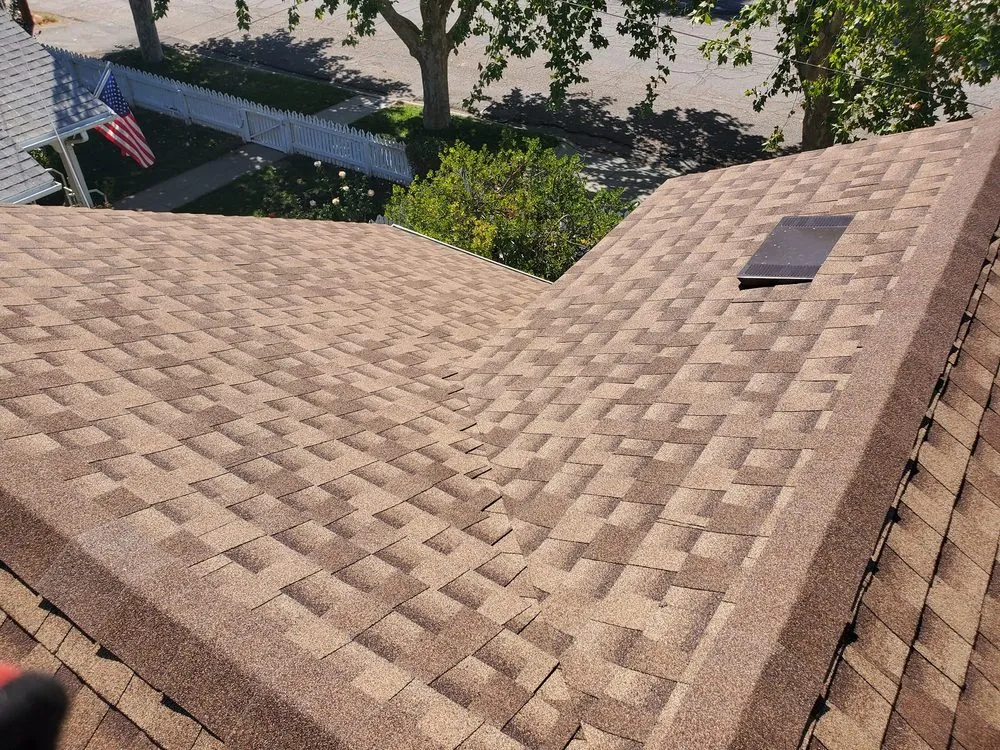 Slide of Echevarria Roofing