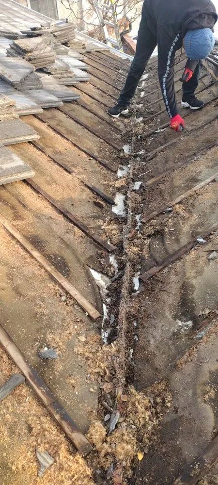 Slide of Echevarria Roofing