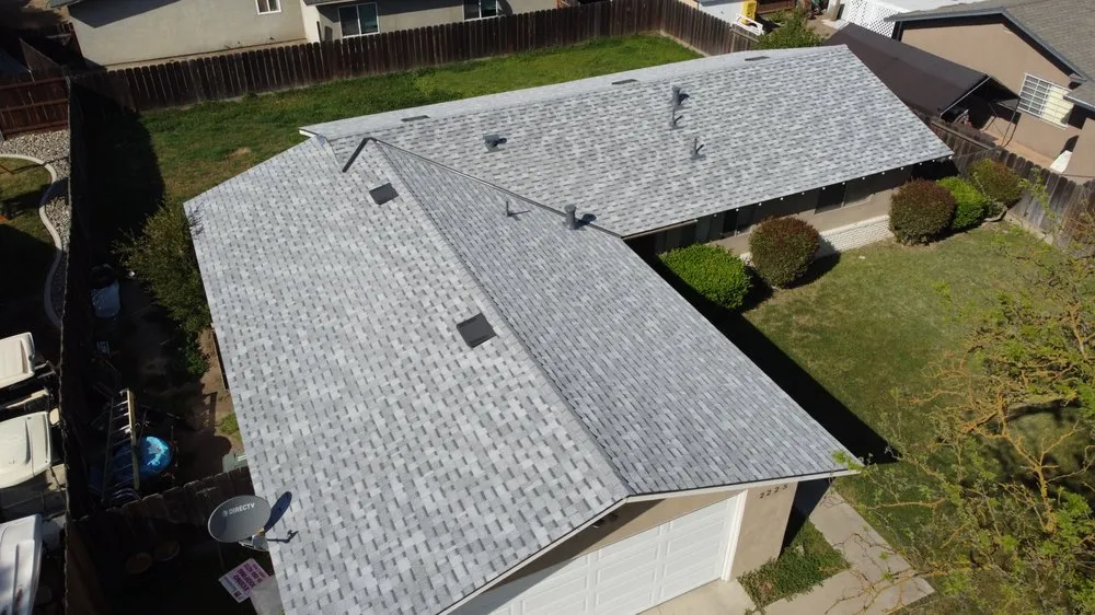 Slide of Econo Roofing