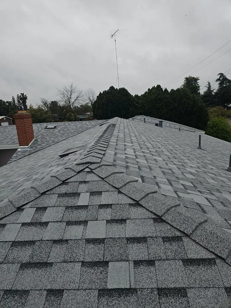 Slide of Econo Roofing