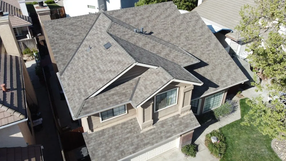 Slide of Econo Roofing