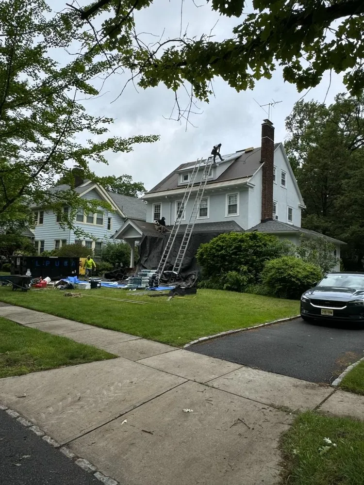 Slide of Economy Asphalt & Roofing