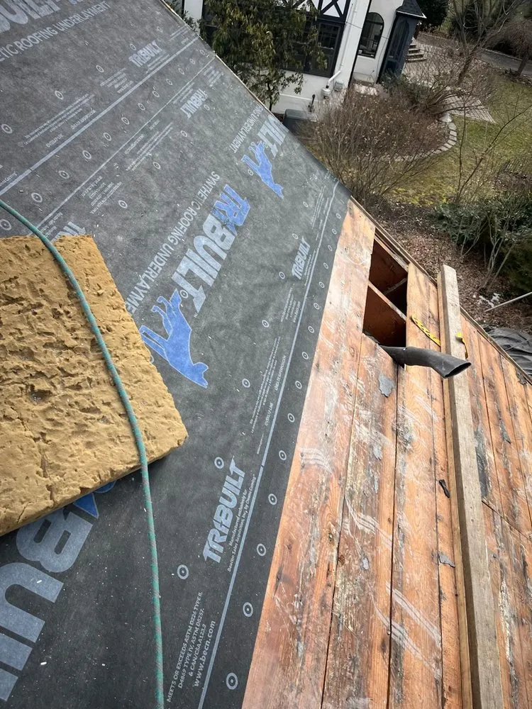 Slide of Economy Asphalt & Roofing