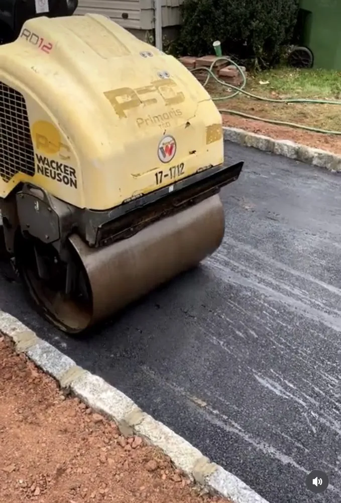 Slide of Economy Asphalt & Roofing