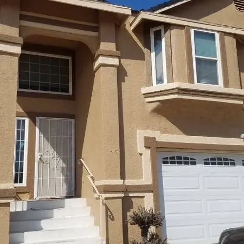 Slide of Economy Roofing & Construction