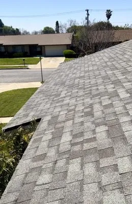 Economy Roofing & Construction Logo