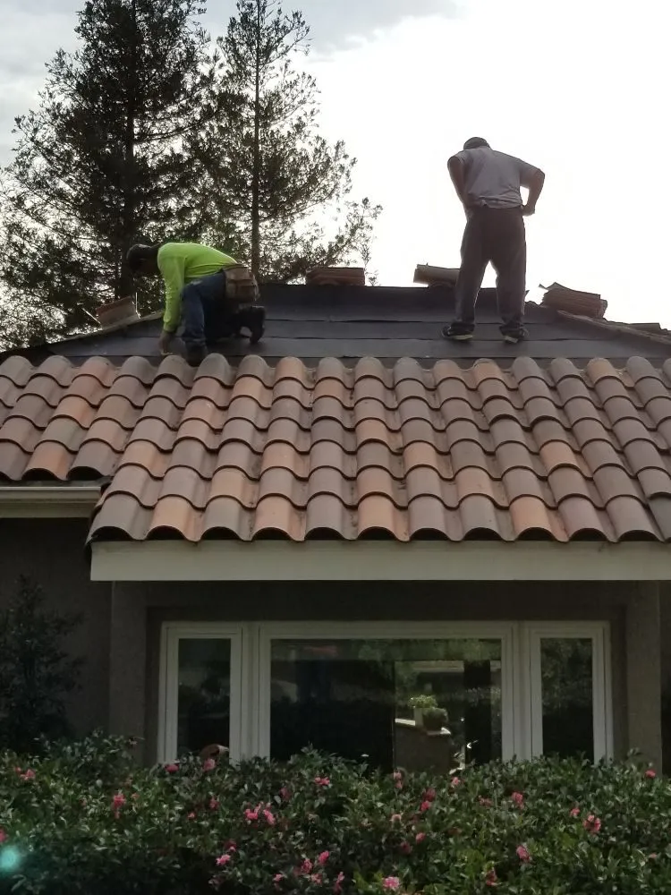 Slide of Economy Roofing & Construction