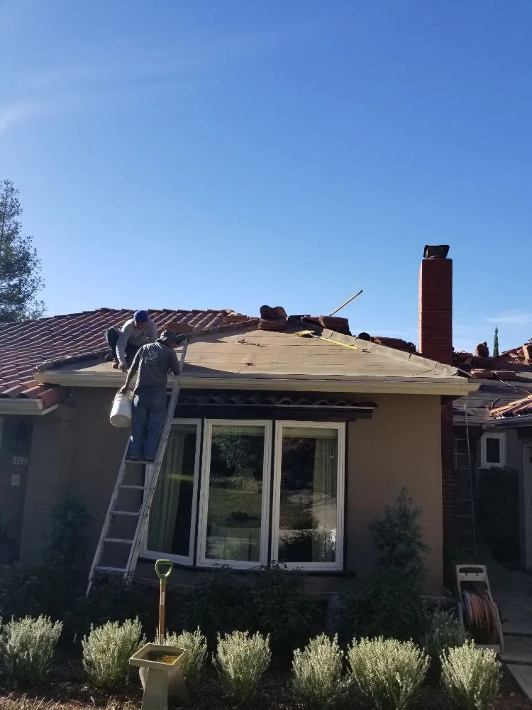 Slide of Economy Roofing & Construction