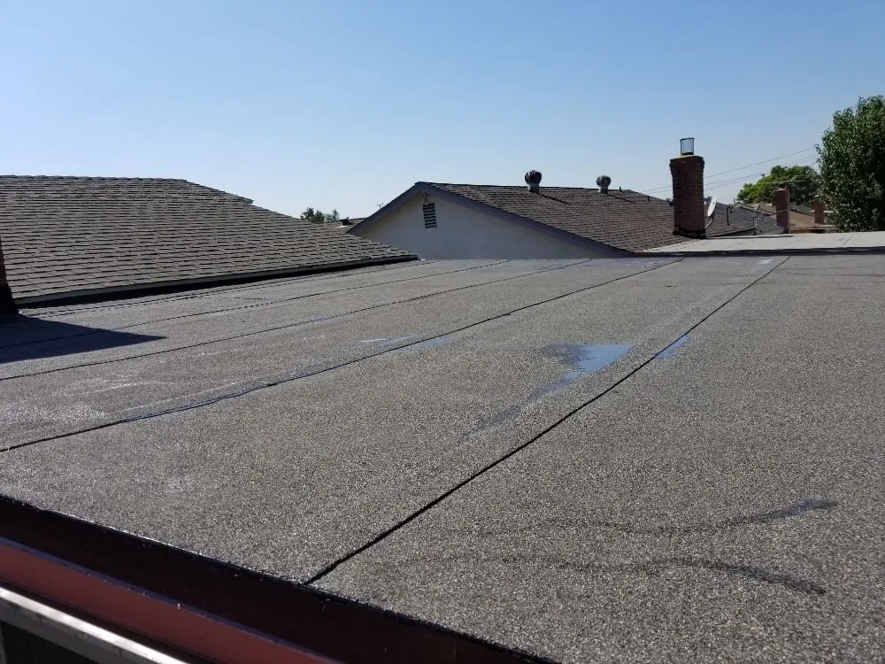 Slide of Economy Roofing & Construction