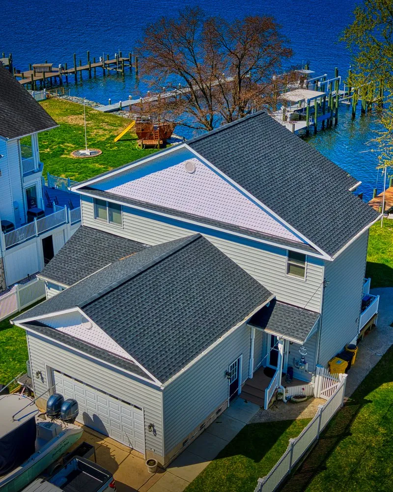 Slide of Economy Roofing & Restoration