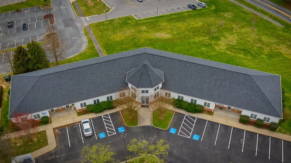 Slide of Economy Roofing & Restoration