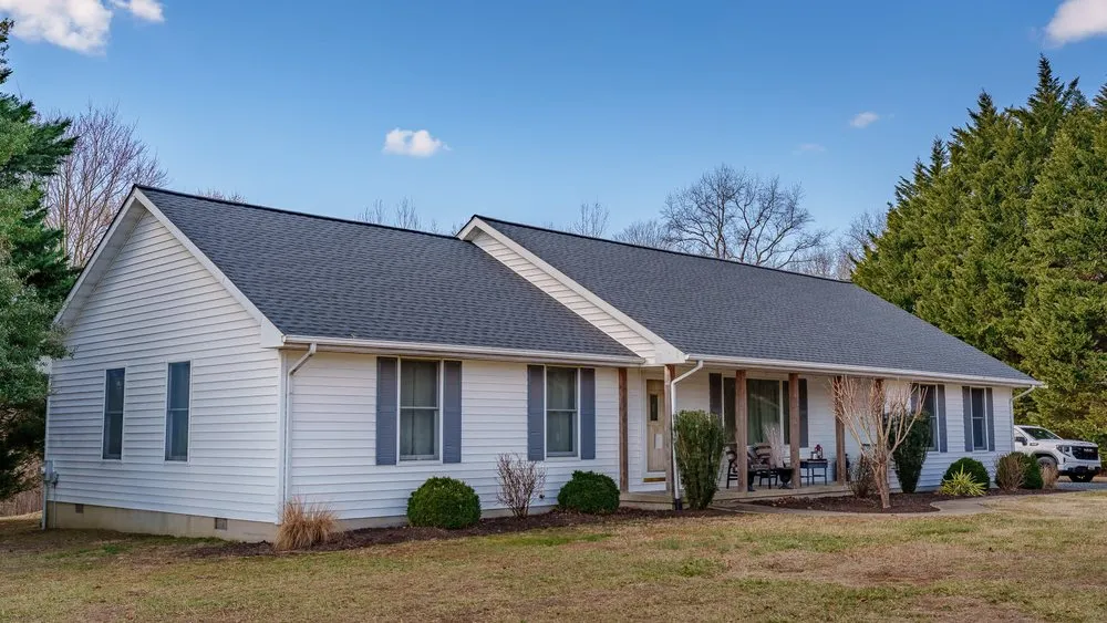 Slide of Economy Roofing & Restoration