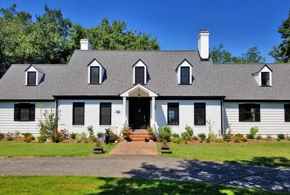 Slide of Economy Roofing & Restoration