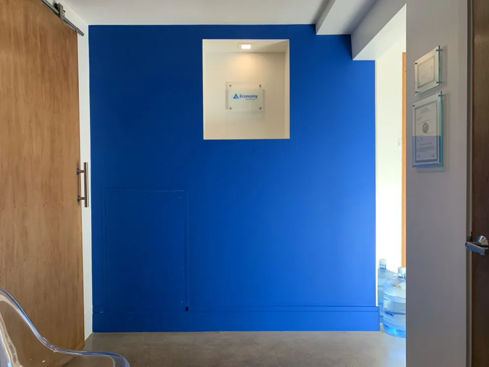 Slide of Economy Roofing