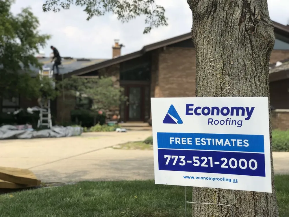 Slide of Economy Roofing