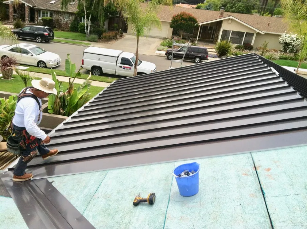 Slide of Economy Roofing