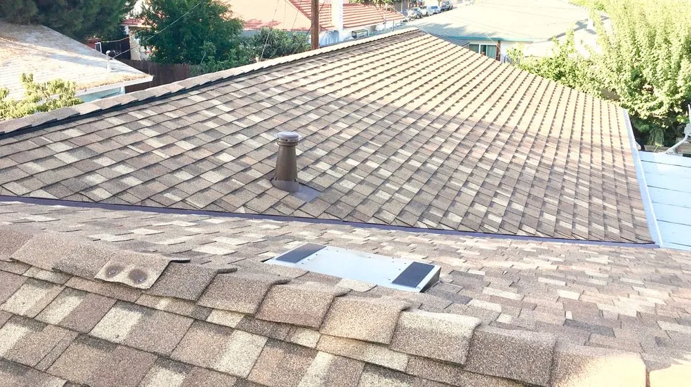 Slide of Economy Roofing